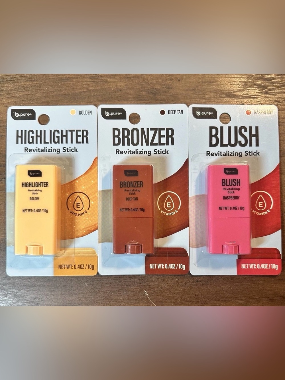 B Pure Revitalizing Sticks Golden
Highlighter, Deep Tan Bronzer, Raspberry Blush